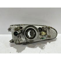 Mitsubishi Colt IV Lampa przednia Lewa - 16050